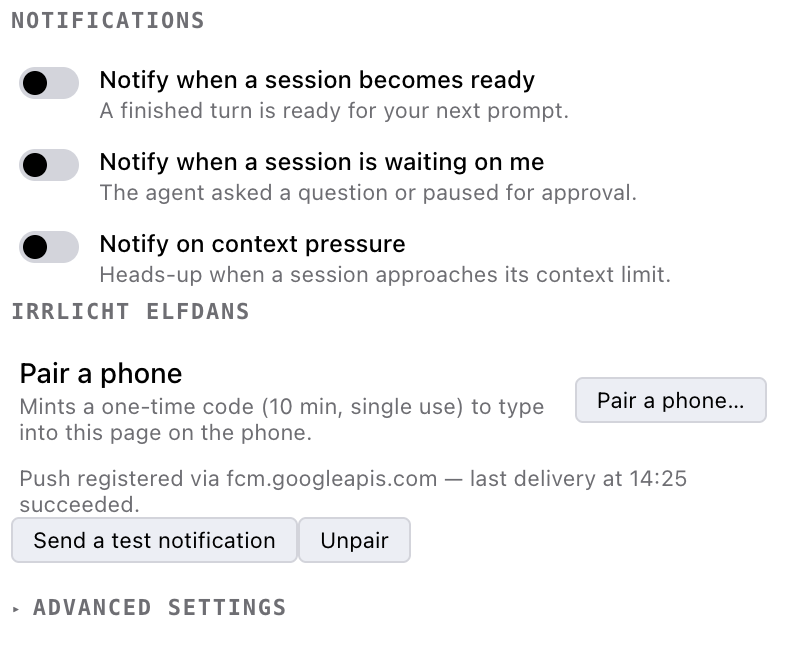 The Irrlicht settings panel showing the notification toggles and an Irrlicht Elfdans section with a Pair a phone button, a line reading push registered via fcm.googleapis.com with a successful last delivery, and Send a test notification and Unpair buttons